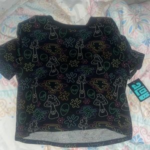 black with neon-ish figures such as muchrooms and aliens